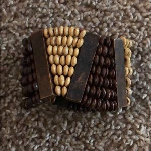 Bracelet made out of wooden beads w/ elastic band